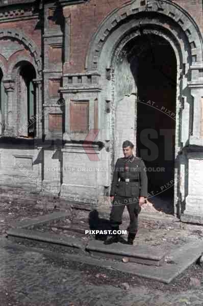 Waffen SS soldier in front of the Lazarevskaya church ruin in Sevastopol, Crimea 1941