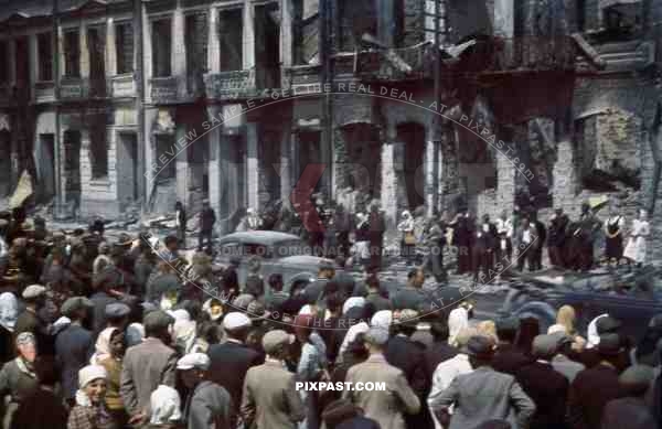 Wehrmacht army vehicle convoy drive through bombed destroyed Smolensk Russia 1942, Parade, Civilians.