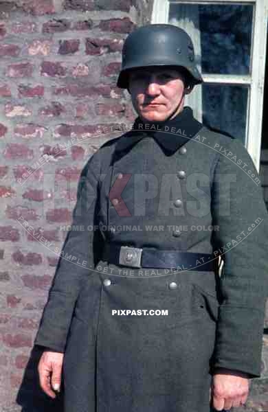Wehrmacht soldier with helmet in NiederauÃŸem, Germany 1940