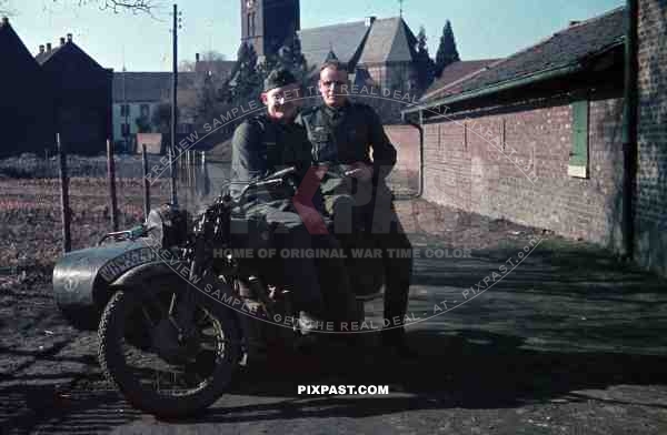 Wehrmacht soldiers with motorbike in NiederauÃŸem, Germany 1940