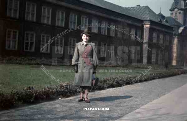 Woman standing in front of the Grassi Museum in Leipzig, Germany 1940