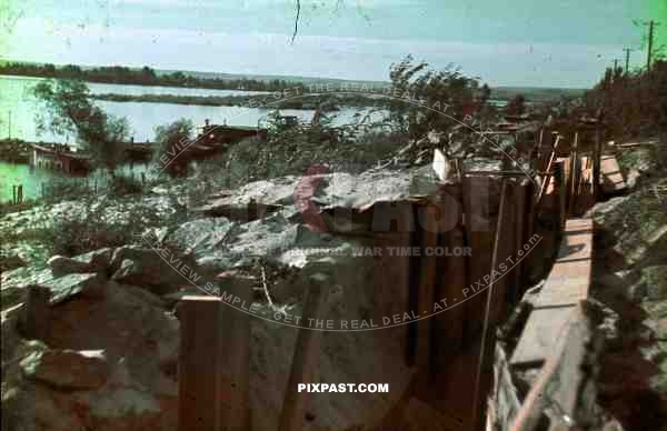 WW2 Color Captured Russian army bunker trench beside river Ukraine 1942