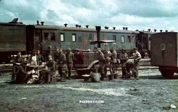 WW2 Color German army field kitchen in train station Train wagons transport Ukraine 1943