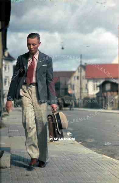 WW2 color Stuttgart Germany 1938 Man hat poster dress costume normal daily life apartment door