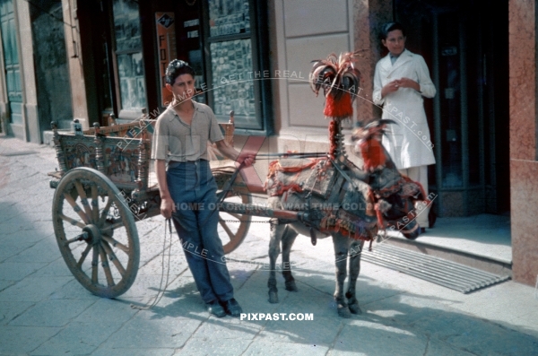 Young boy with his donkey and cart in front of Agfa photo shop in Athens Greece 1937