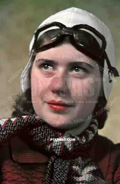 Young german woman Berlin 1940 wearing flying / driving goggles and white leather helmet