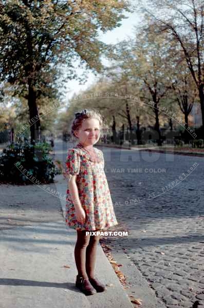 Young girl in colorful dress photographed by an American Army Doctor. Berlin Germany 1946