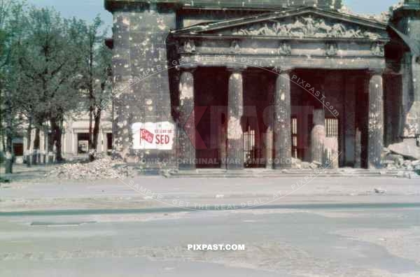 Badly damaged Neue Wache historical building. Unter den Linden. Berlin 1946. Political SED poster