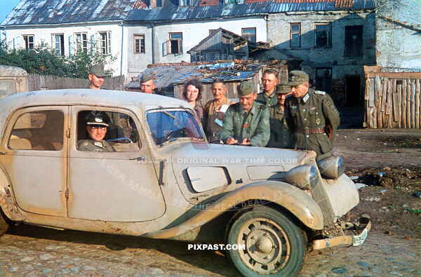 Captured French army Citroen Traction Avant 1938 car in cream camouflage paint. Polish Village 1944