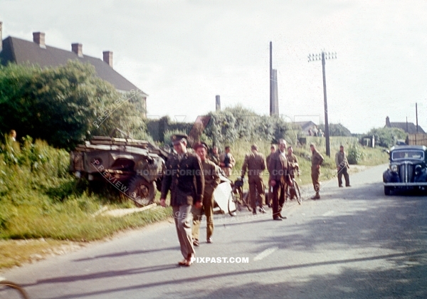 Car crash outside London England 1944. Dodge M37 Us Army truck.  Soldiers joking about crash.