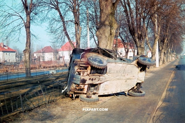 Crashed German army Volkswagen VW Kubelwagen jeep car in Berlin Germany 1940. Photographed by a berlin police man