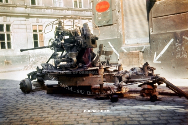 Final Street battle of Vienna Austria April 1945. Knocked out Russian built 3.7cm Flak cannon in middle of the streets.