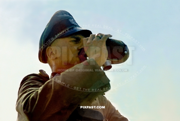 German army officer drinking water from his drink bottle. Nachrichten Abteilung Signals 297 Infantry Division. Russia 1941