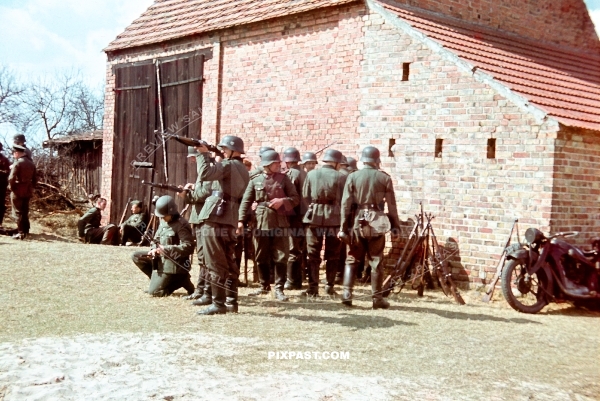 German army soldiers training with Kar98 rifles and yellow rubber band helmets. 8th Panzer Division. Russia August 1942