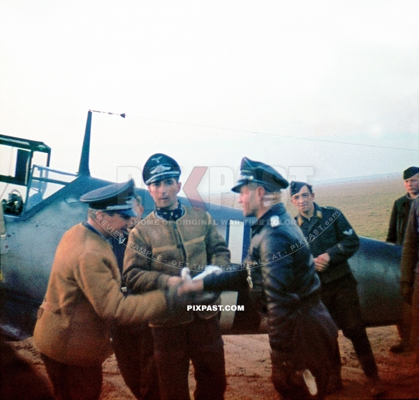 German Luftwaffe Me109 fighter plane ace Werner Molders. In winter jacket beside his Messerschmitt Bf 109 France 1940