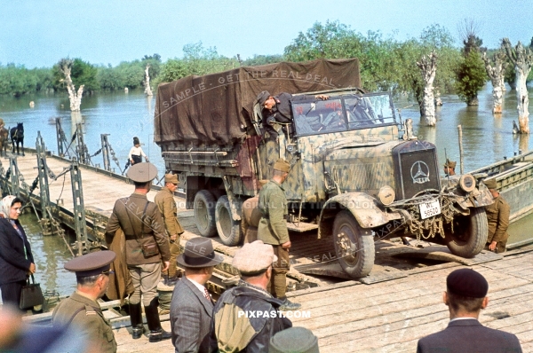 German Luftwaffe Mercedes-Benz Typ LG3000 heavy truck in late war camo on Romanian pontton bridge. Krimea April 1944
