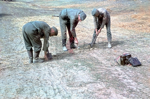 German Radio Telephone FUNKER unit burying communication cables in Russian battle field. 297 Infantry Division. Russia 1942