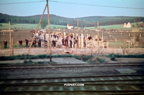 German Wehrmacht soldiers prisoner in open POW camp field outside of Berlin Germany 1945