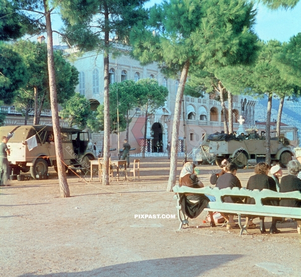 German Wehrmacht tropical camo Funker radio trucks parked in front of Princes Palace of Monaco. 1943