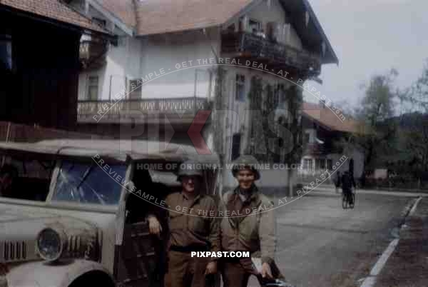 GIs of the 101st Cavalry Regiment in Ruhpolding Bavaria 1945 with captured sand camo Stoewer Typ 40 