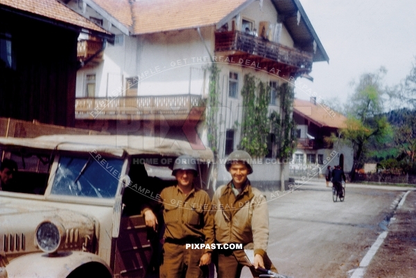 GIs of the 101st Cavalry Regiment in Ruhpolding Bavaria 1945 with captured sand camo Stoewer Typ 40 