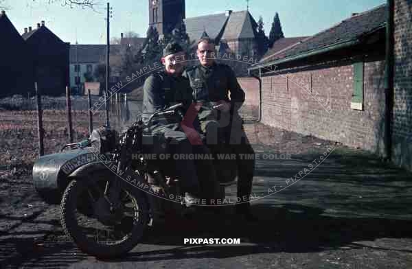 Wehrmacht soldiers with motorbike in Niederaussem, Germany 1940