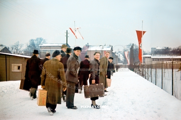 Young German men with travel cases volunteering for military service. Winter Germany 1939. Later 8th Panzer Division soldiers