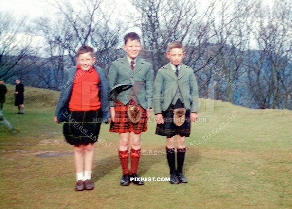 Young man Ian Miller standing with his friends in traditional Scottish kilt near Edinburgh Scotland. War time 1944