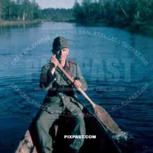134th Gebirgsjaeger, Finland 1944, german soldier in boat on river.