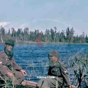 134th Gebirgsjaeger, Finland 1944, german soldier in boat on river, mosquito mask