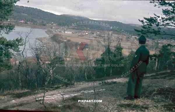 134th Gebirgsjäger, Finland 1944, German soldier looking down valley at small fishing village