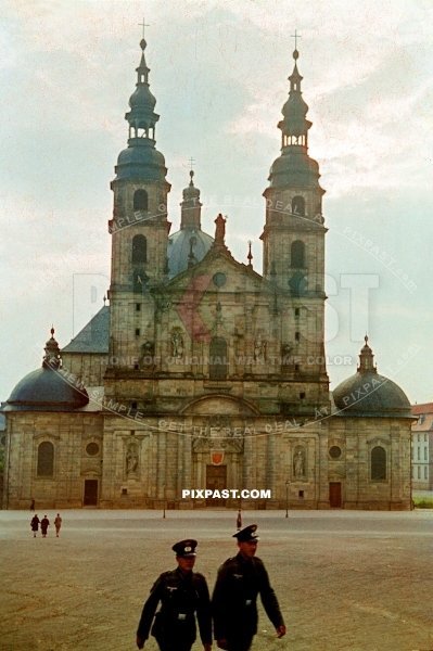 2 German army soldiers passing the Fuldaer Dom in Fulda Germany 1941. Dom St. Salvator zu Fulda