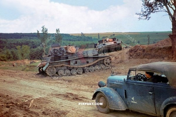 2 knocked out and burned German army Panzer 4 tanks. Opel Olympia staff car. Russia summer 1942. 297 Infantry.