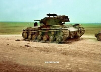 3 German shell holes in turret of Kliment Voroshilov KV1 Heavy Russian tank for inspection. 19th Panzer Division Russia 1941