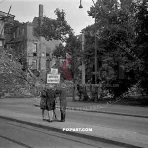 69th, infantry, division, Leipzig, Germany, 1945, June, Belgium, MPs, caught, tresspassing, must hold sign for one hour,