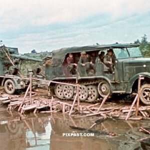 88mm artillery piece is towed by a SdKfz 6 half-track, 19th Panzer Division, Minsk, Russia 1941