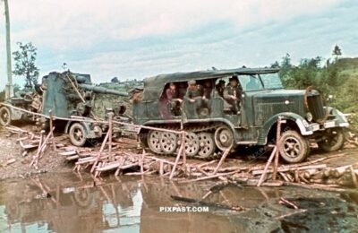 88mm artillery piece is towed by a SdKfz 6 half-track, 19th Panzer Division, Minsk, Russia 1941