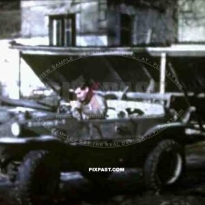 8mm home movie, France 1944, American GI soldier driving captured German Volkswagen Schwimmwagen Jeep.