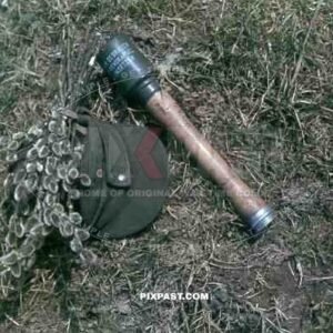 A German soldier photographs his weapons. Polish Russian border Spring  1944.