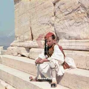 A young Greek boy wearing Traditional Tsolias attire. Acropolis Athens Greece. April 1941