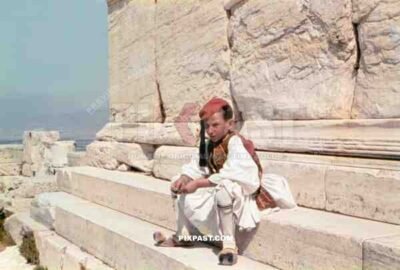 A young Greek boy wearing Traditional Tsolias attire. Acropolis Athens Greece. April 1941