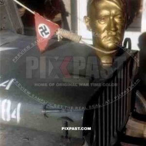 Adolf Hitler statue head bolted to front of American Willi Jeep as   war trophy, Heidelberg Germany 1945. 101st Cavalry Regiment.