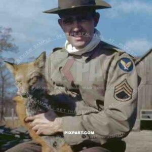 American Army AirForce  training instructor with USAF Army Campaign Hat and mascot pet Fox. Larson Air Force Base 1942