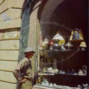 American GI soldier searching the antique shops of Rome Italy.
Fifth Army in its capture of Rome in June 1944.