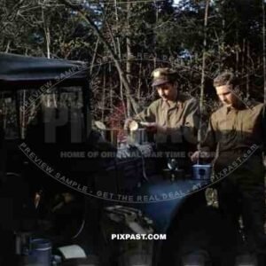 American airforce officers eat K rations beside 1942 Dodge WC-51 3/4 ton Weapons Carrier, France 1944.