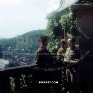 American officers of the 101st Cavalry Regiment in Heidelberg Germany 1945. Heiliggeistkirche Church in background.