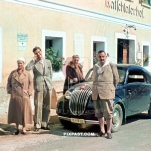 Austrian family going on weekend road trip in their 1936 Steyr Typ 50 in front of the Guest house . Austria 1939