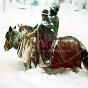Austrian farmer man and wife riding horses in deep winter snow. In traditional rural costume. Austria winter 1939