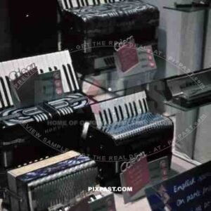 Berlin, 1939, Accordion Music shop window, Consumer Products, service offered in English and french. Odeon