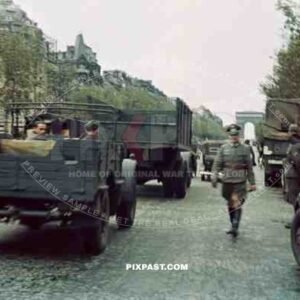 British Morris CS8 Supply truck of the 6. Infantry Division entering Paris France 1940. Champs Elysees